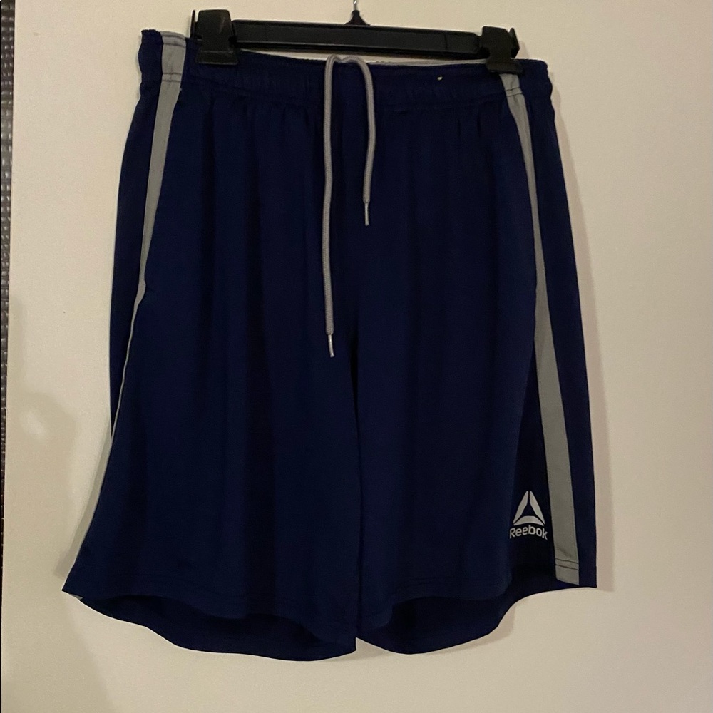 Reebok Mens shorts are a size Medium